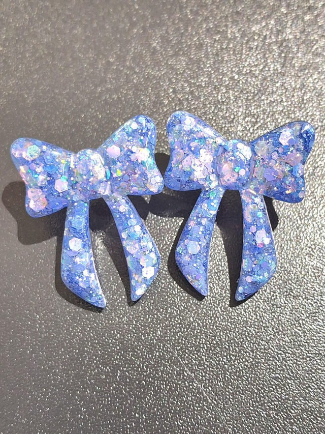 Large statement bow stud earrings