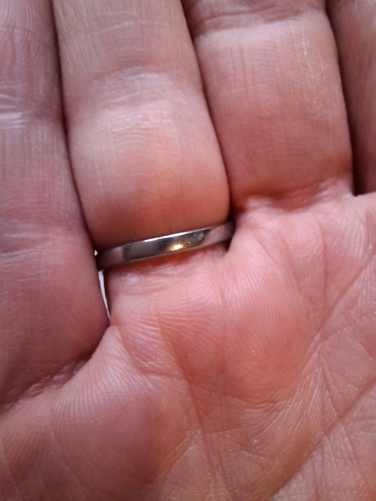 Adjustable stainless steel ying and yang style wraparound ring
