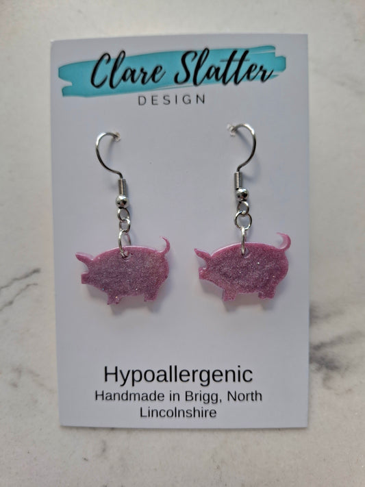 Pig dangles