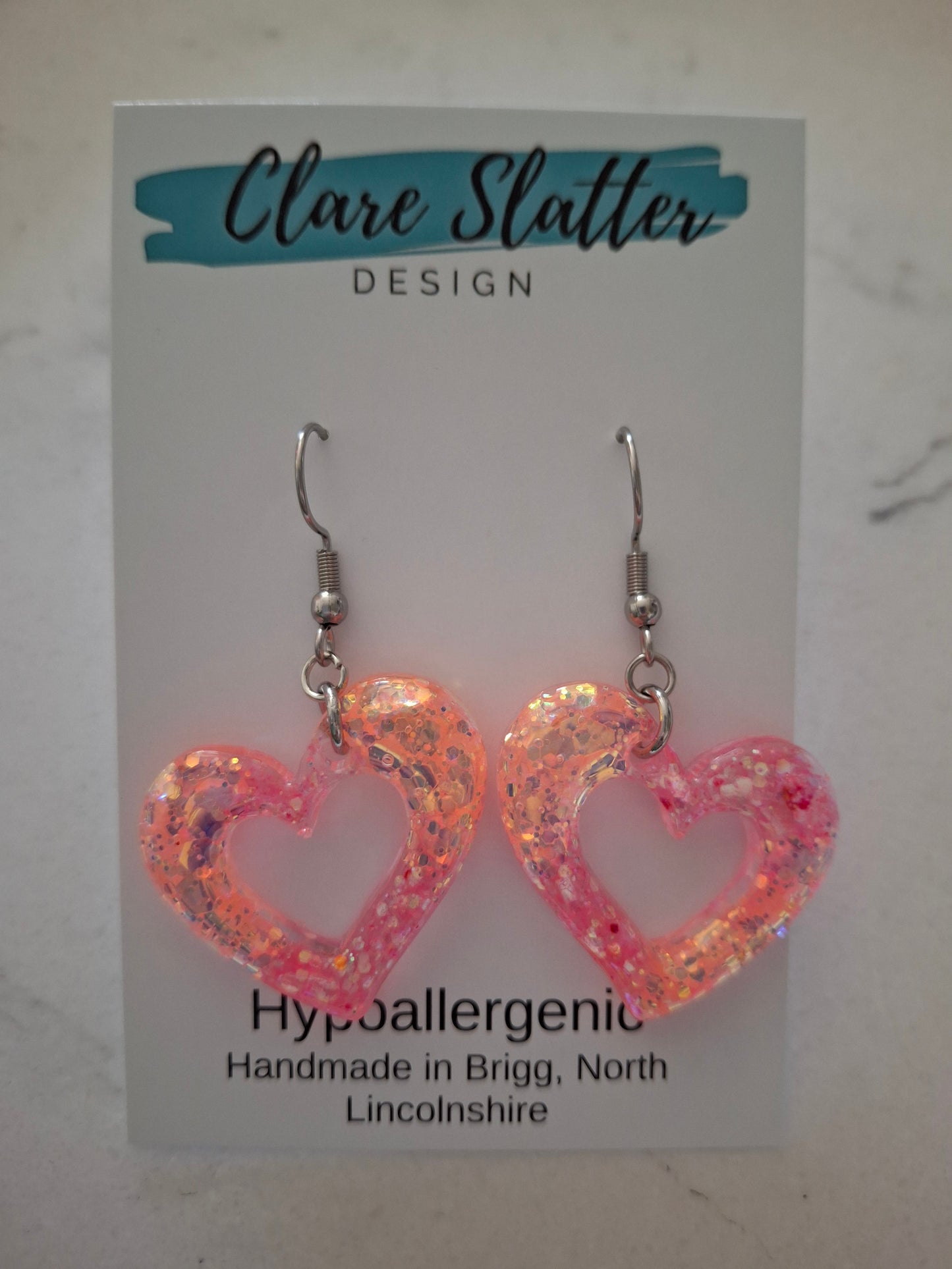 Cut out heart dangles available in various colours